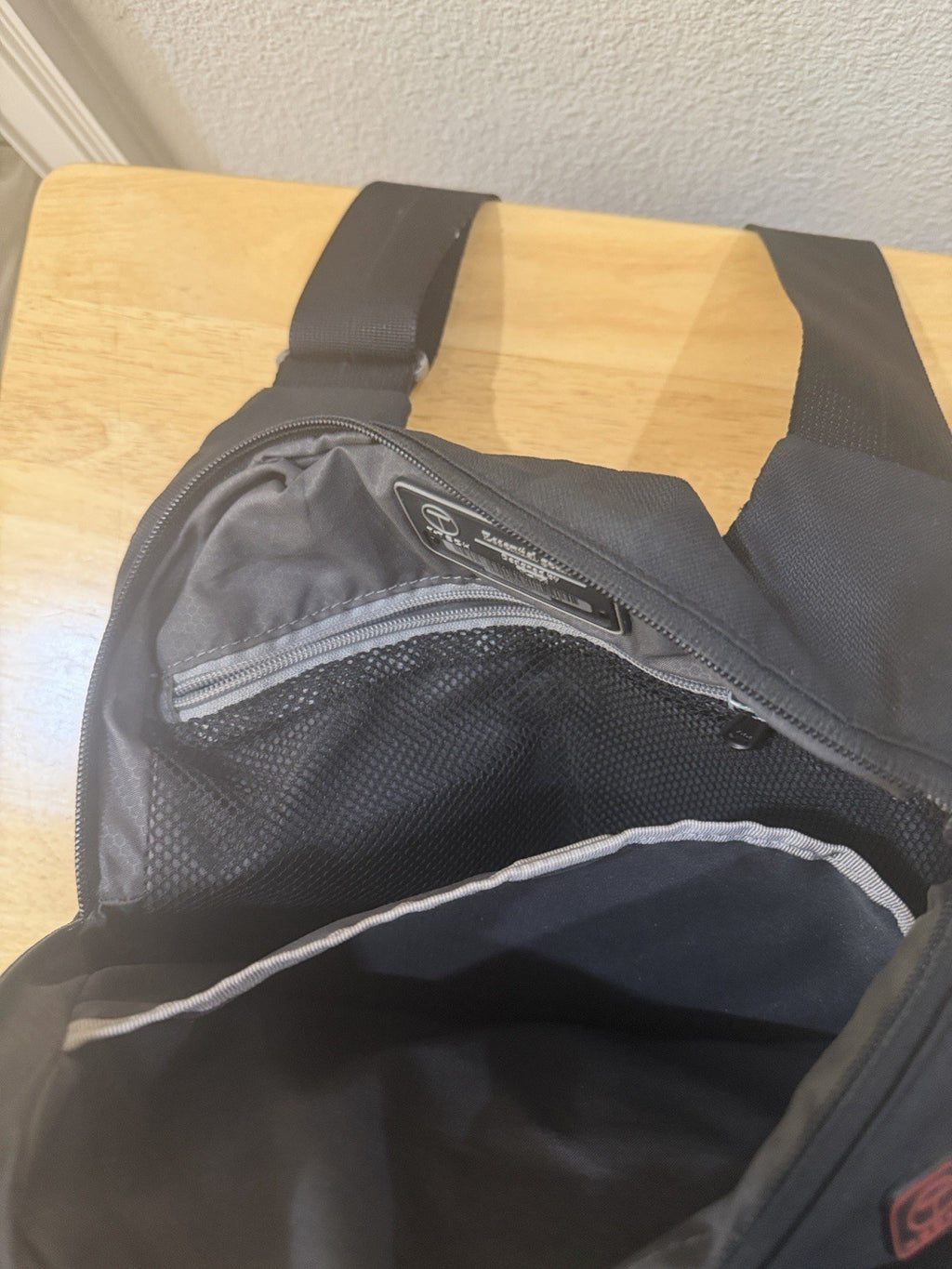Tech Black Laptop Bag with A Dedicated Front Pocket for Quick-access Items.3