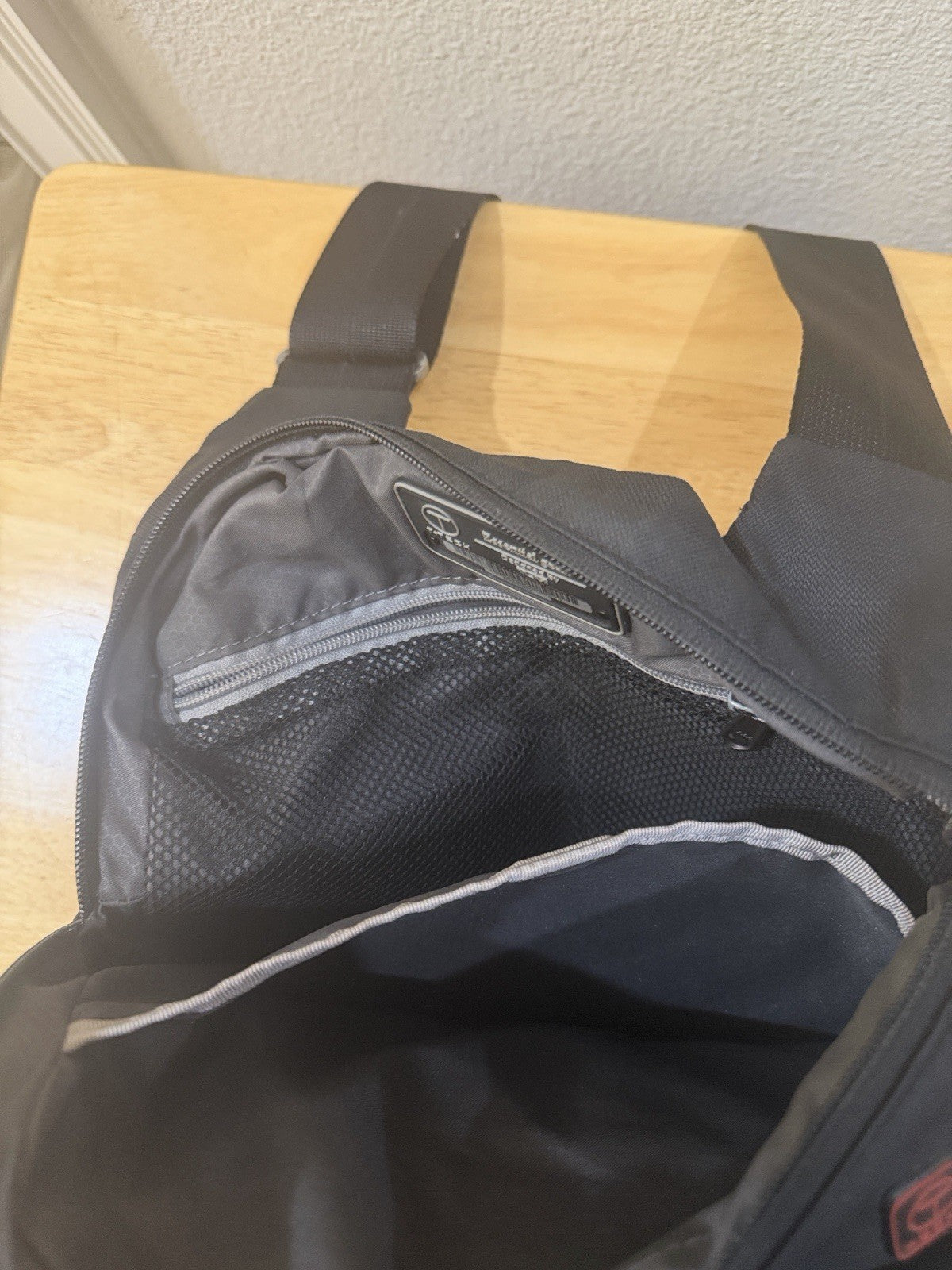Tech Black Laptop Bag with A Dedicated Front Pocket for Quick-access Items.3