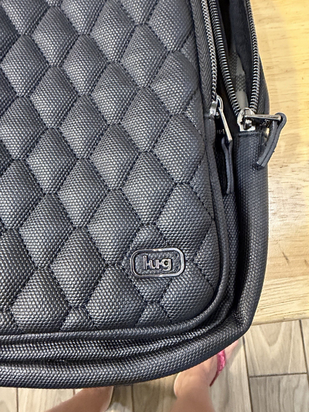 Compact Lug Sling Bag with Quilted Front Panel. Multiple Zip Pockets Black0