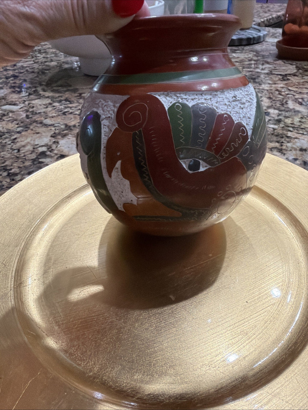 handcrafted vessel is a piece of San Juan de Oriente pottery from Nicaragua.0