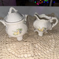A vintage style porcelain sugar bowl and creamer set, collectible teaware.0