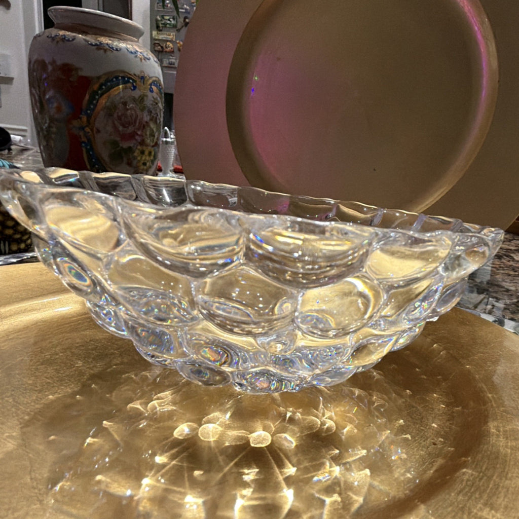 This crystal bowl is the Orrefors Raspberry pattern, designed by Anne Nilsson.2