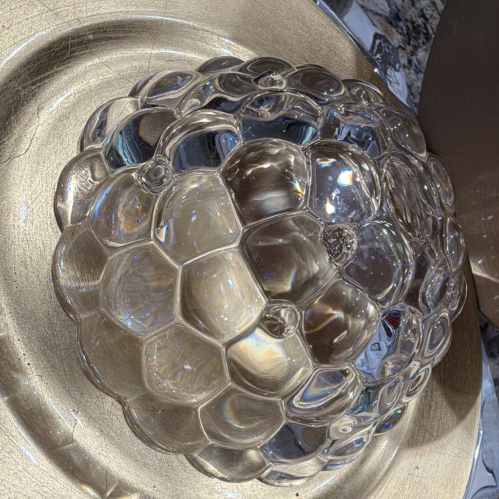 This crystal bowl is the Orrefors Raspberry pattern, designed by Anne Nilsson.1