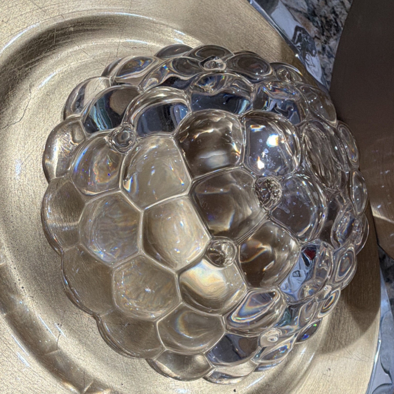 This crystal bowl is the Orrefors Raspberry pattern, designed by Anne Nilsson.1