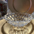 This crystal bowl is the Orrefors Raspberry pattern, designed by Anne Nilsson.0