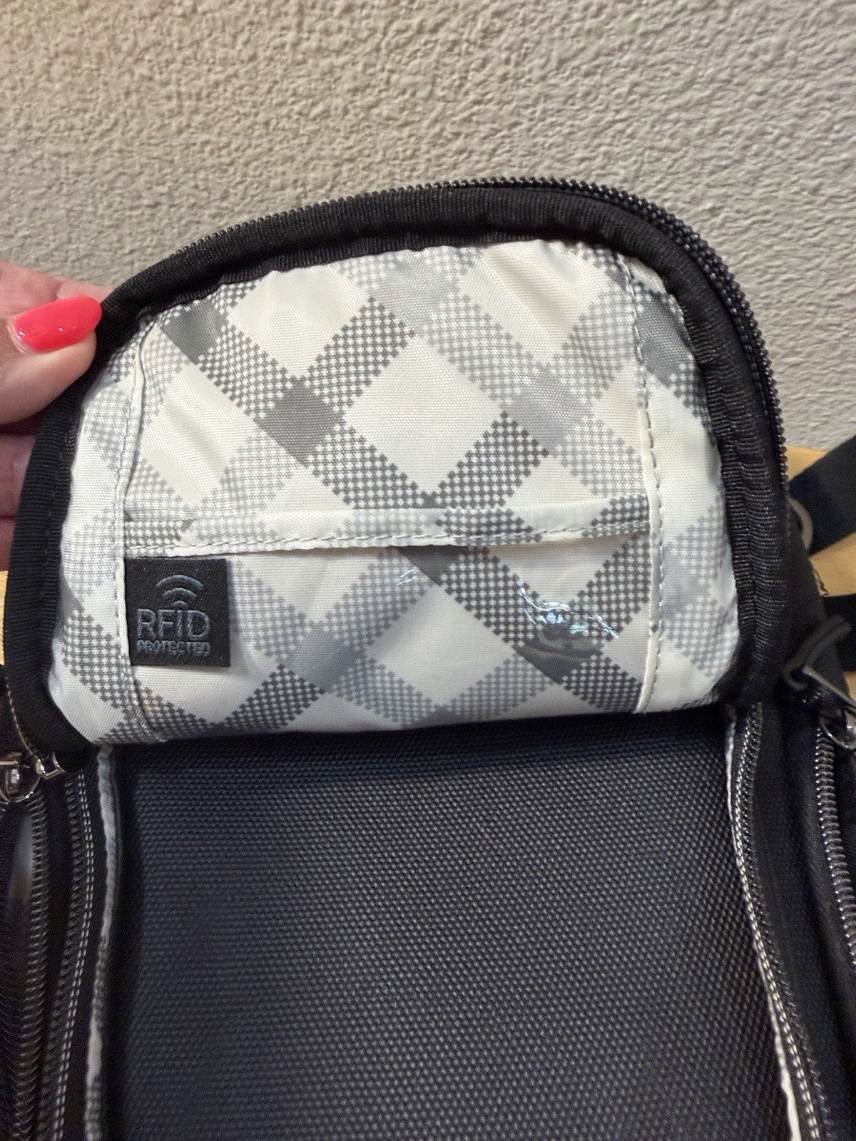 Compact Lug Sling Bag with Quilted Front Panel. Multiple Zip Pockets Black2