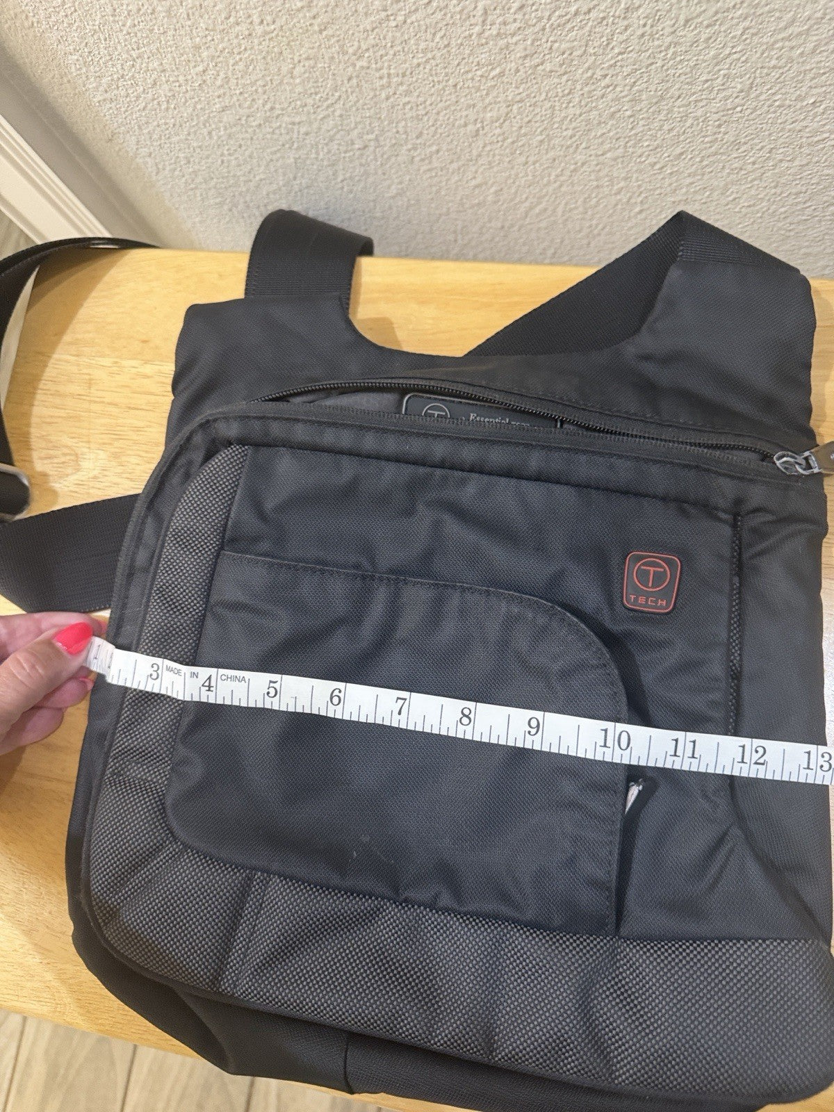 Tech Black Laptop Bag with A Dedicated Front Pocket for Quick-access Items.6