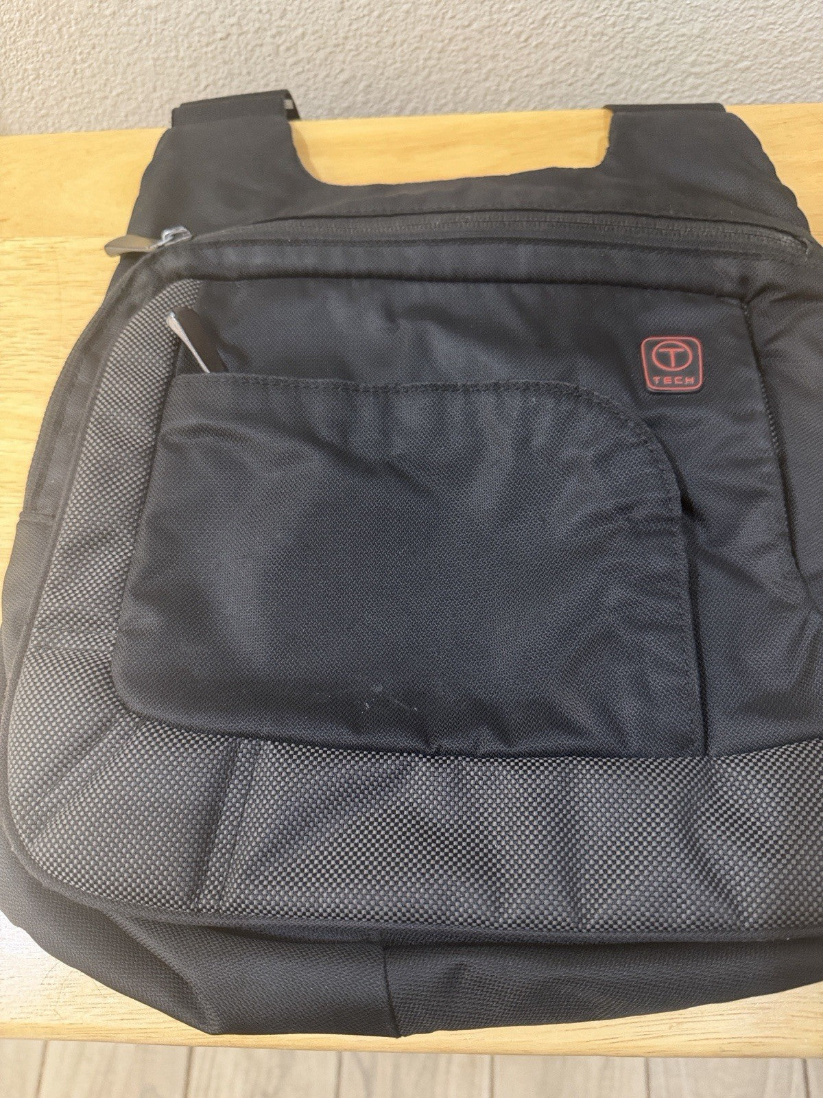 Tech Black Laptop Bag with A Dedicated Front Pocket for Quick-access Items.1